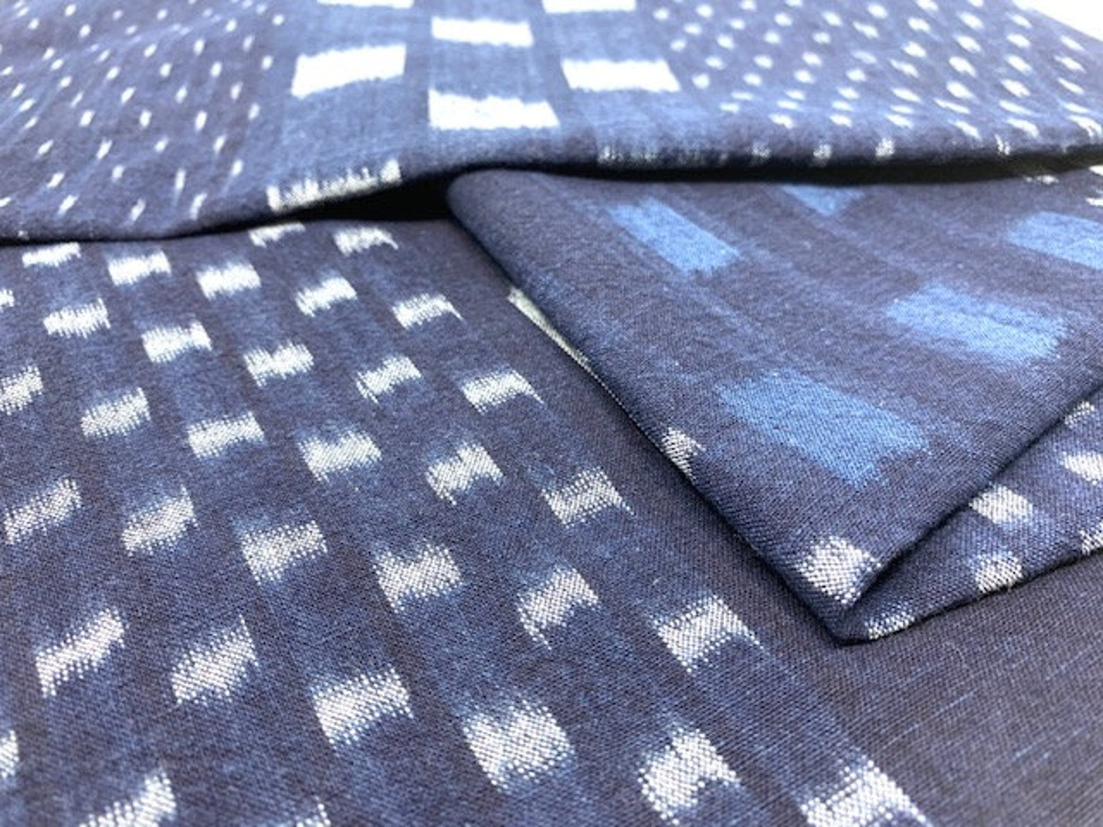 Japanese indigo fabric multipatterned checkered kasuri cotton fabric by the yard close up | BANSYO